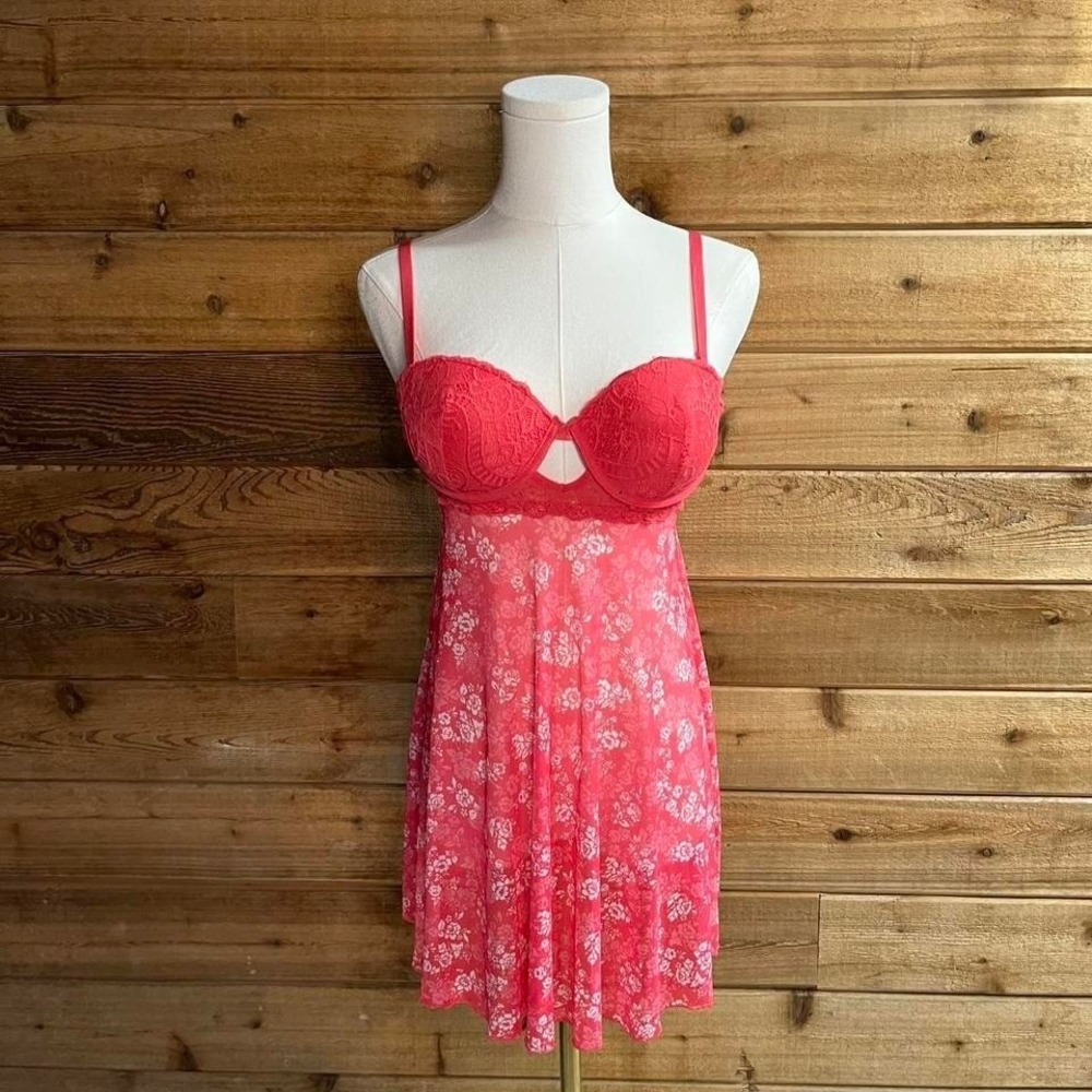 Red floral lace babydoll dress with adjustable straps and a flowy skirt.
